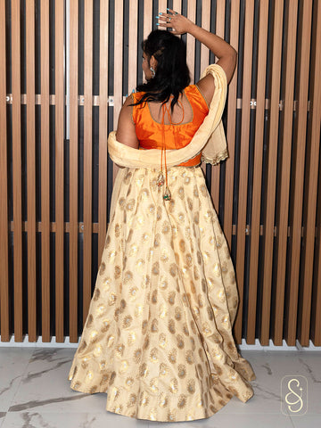 Off-White Brocade Lehenga With Orange Silk Blouse