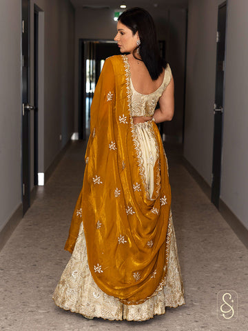 Embroidered Off-White Tissue Silk Lehenga
