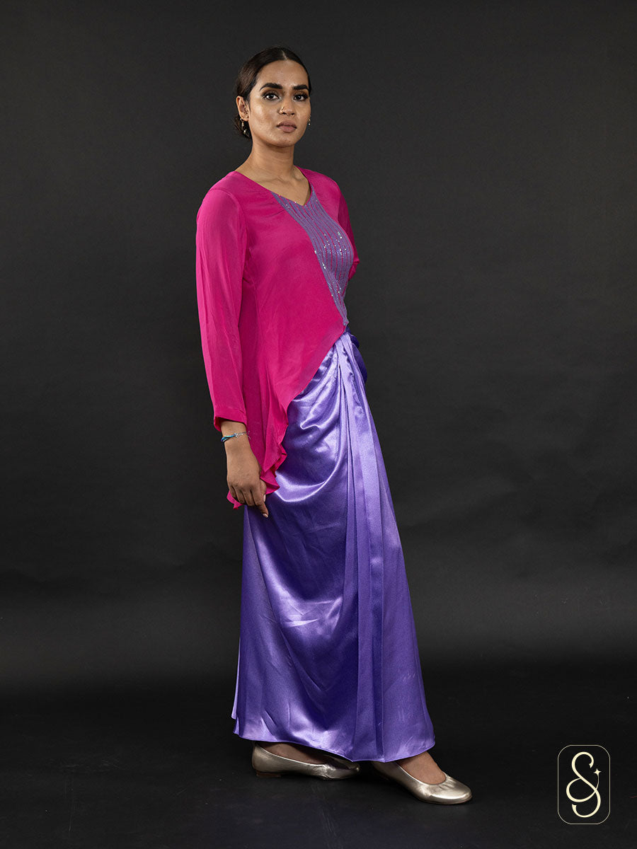 Right side view of a purple skirt and and crepe top