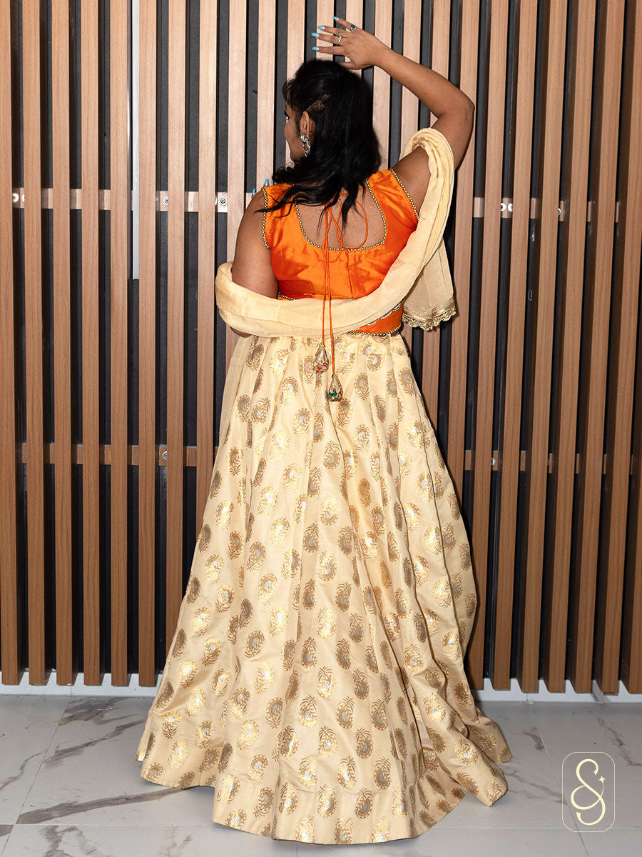 Off-White Brocade Lehenga With Orange Silk Blouse
