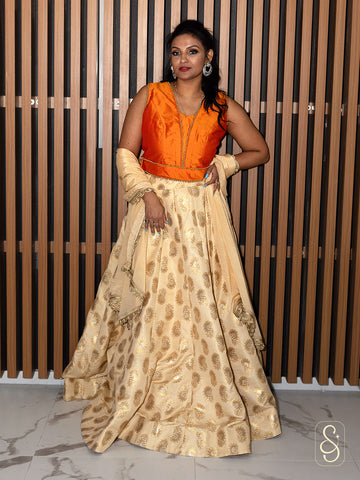 Off-White Brocade Lehenga With Orange Silk Blouse